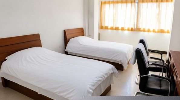 Fujian Medical University international student hostel room, twin-share double room with study desks and wardrobes at Qishan Campus, Fuzhou