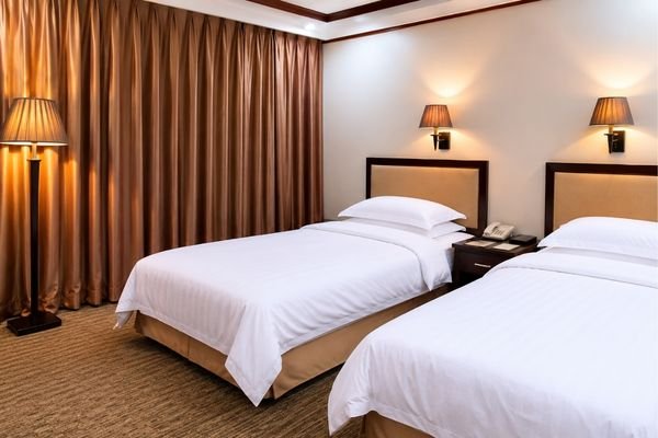 Hosteluni-shenyang-medical-college-hostel-room - MTZ Global Visa Consultants Shenyang Medical College international student hostel room, twin-share accommodation
