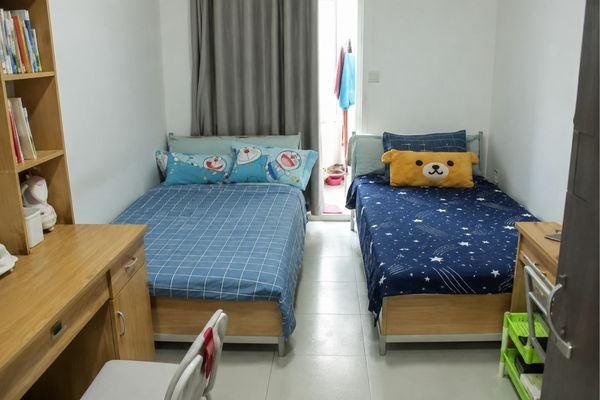 Zhejiang Chinese Medical University international student hostel room, twin-share accommodation.