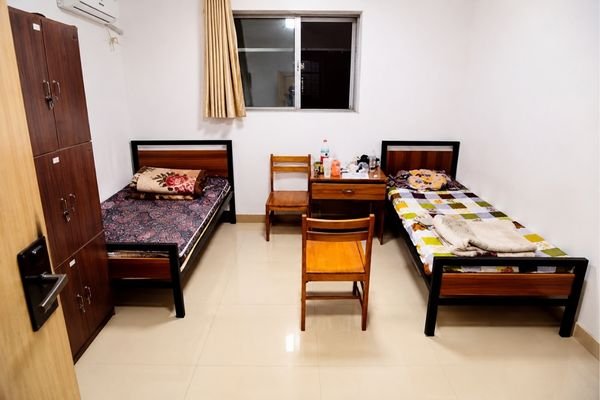 uni-youjiang-medical-university-hostel-room. - MTZ Global Visa Consultants Youjiang Medical University for Nationalities international student hostel room, twin-share accommodation